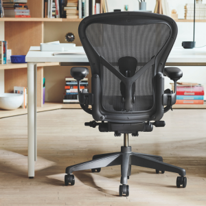 Herman Miller Aeron Chair in Graphite, Size B. Ergonomic office chair with breathable mesh, adjustable lumbar support.